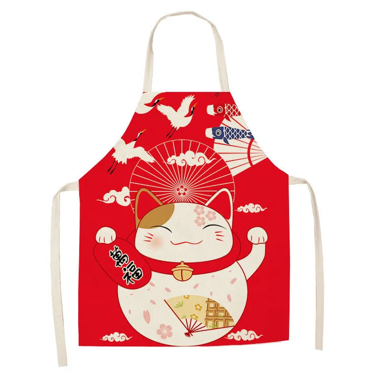 Red kawaii apron with a cartoon cat design on a white background