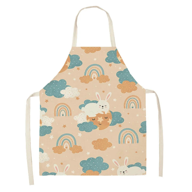 Children's kawaii apron with cloud and rainbow pattern on a beige background