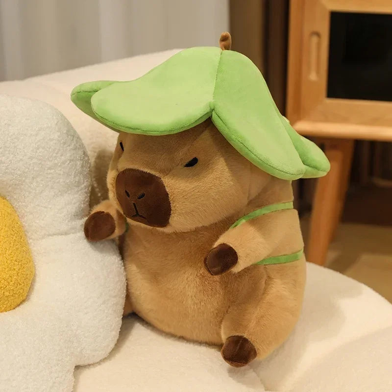 Kawaii plush toy resembling a character with a green hat on a white surface