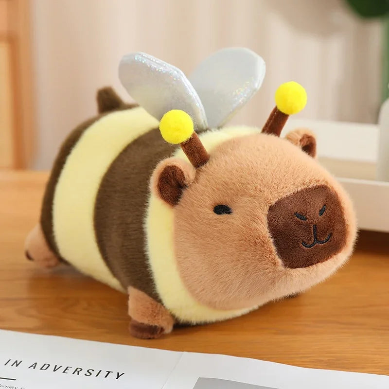 Kawaii plush toy shaped like a bee on a wooden surface