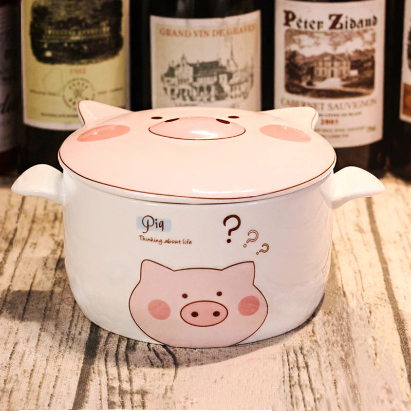 Ceramic kawaii ramen bowl with pig design on a wooden surface with wine bottles in the background