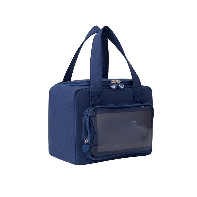 Navy blue kawaii tote bag with a clear front pocket on a white background
