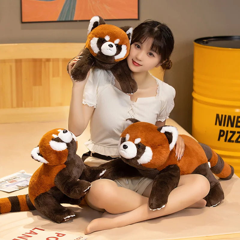 Woman holding kawaii plush red pandas in a casual setting