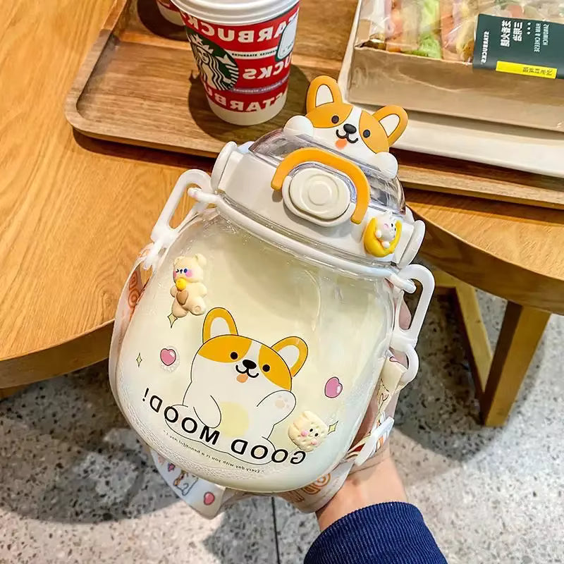 Clear kawaii bottle with cartoon dog design held by a person, Starbucks cup in the background