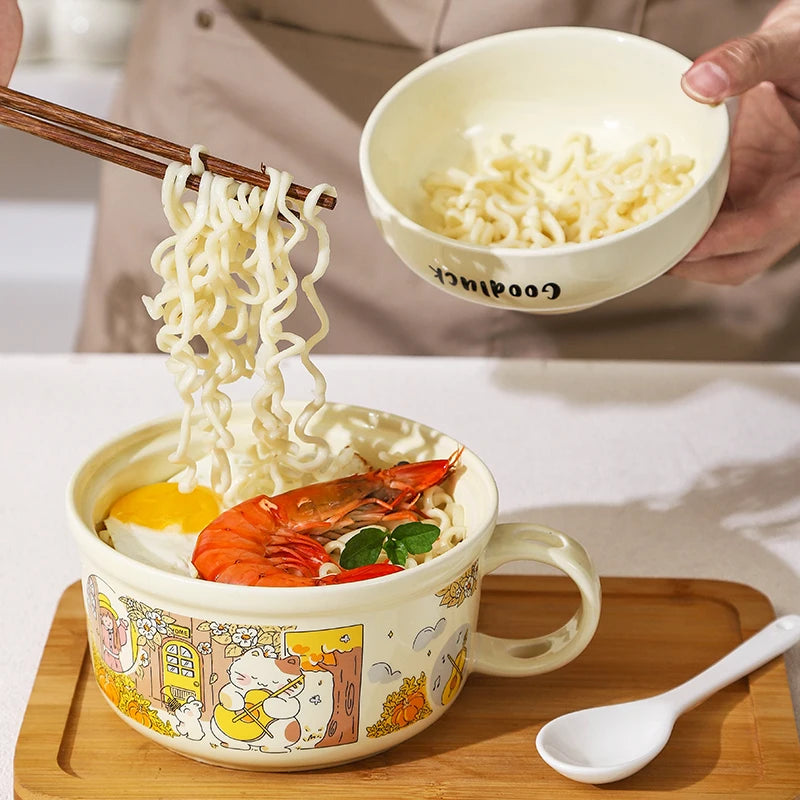 Someone eating noodles with a large kawaii ramen bowl