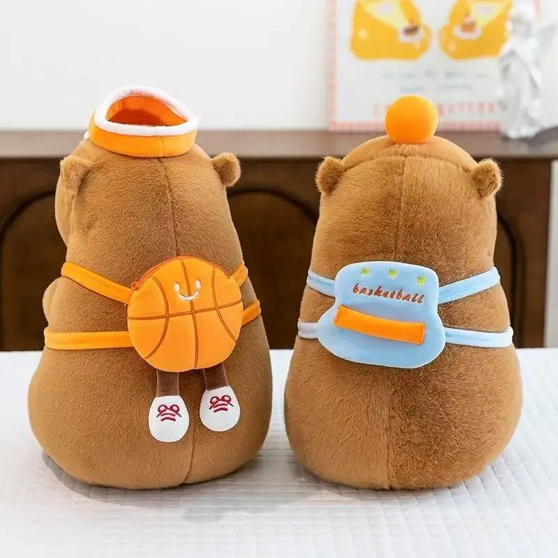 Two brown kawaii plush toys with basketball-themed accessories on a white surface.