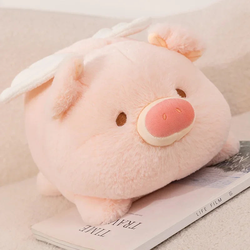 Kawaii plush pig toy on a magazine with a soft background