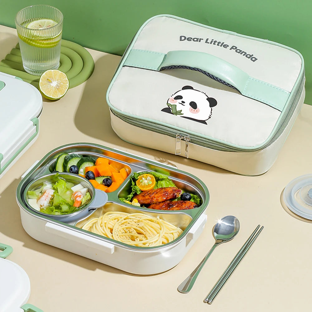 Lunch box with kawaii panda design on lid, divided compartments with food, and utensils on a table.