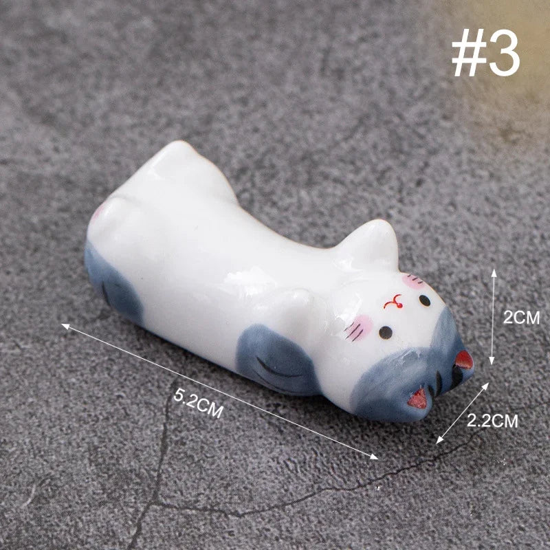 A cat shaped kawaii chopstick holder with measurements