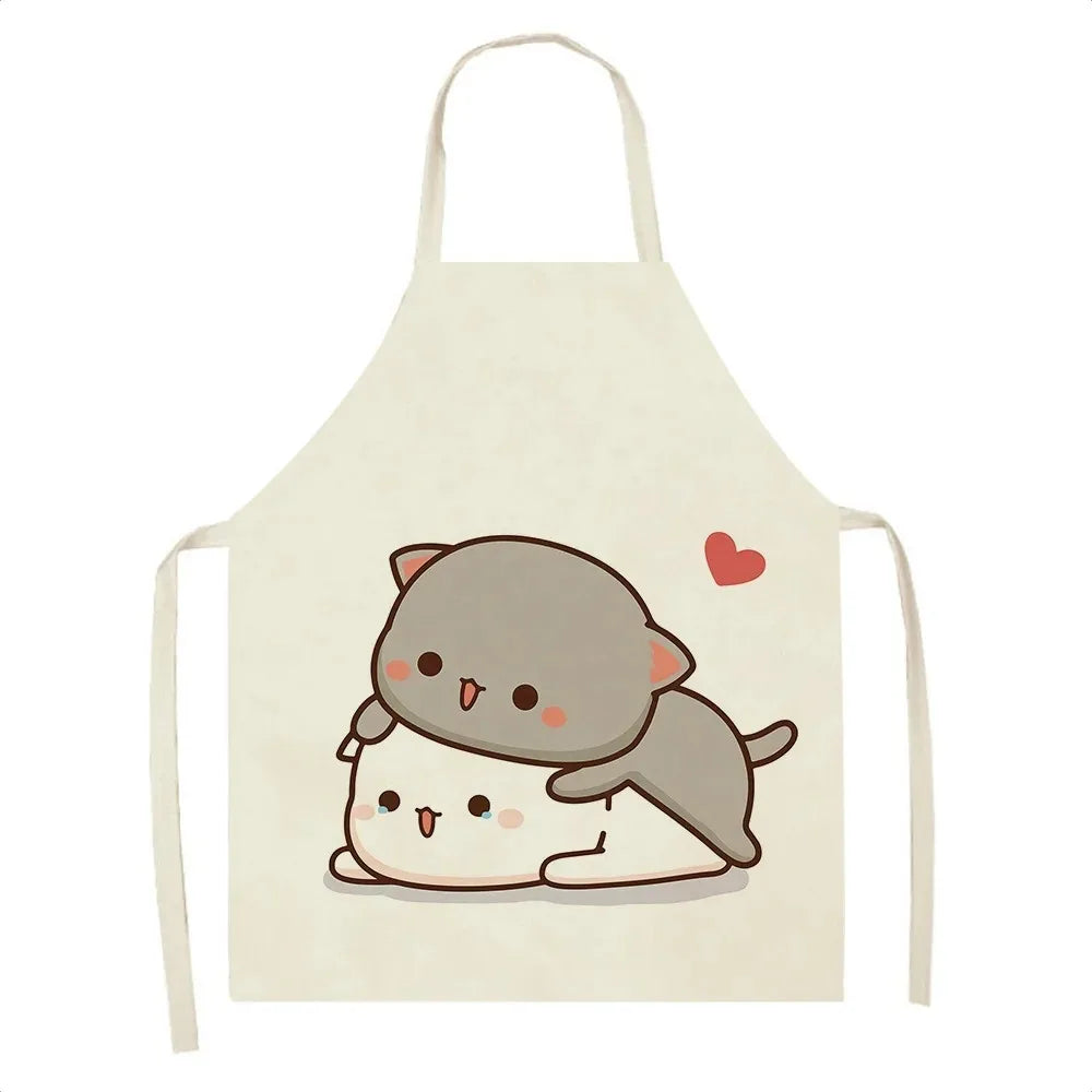 Beige apron with a Kawaii cartoon design of a cat and dog hugging on a white background