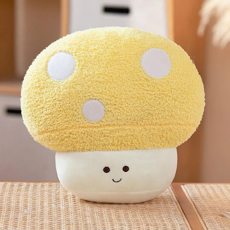 Yellow kawaii plush mushroom toy with a smiling face on a wooden surface.