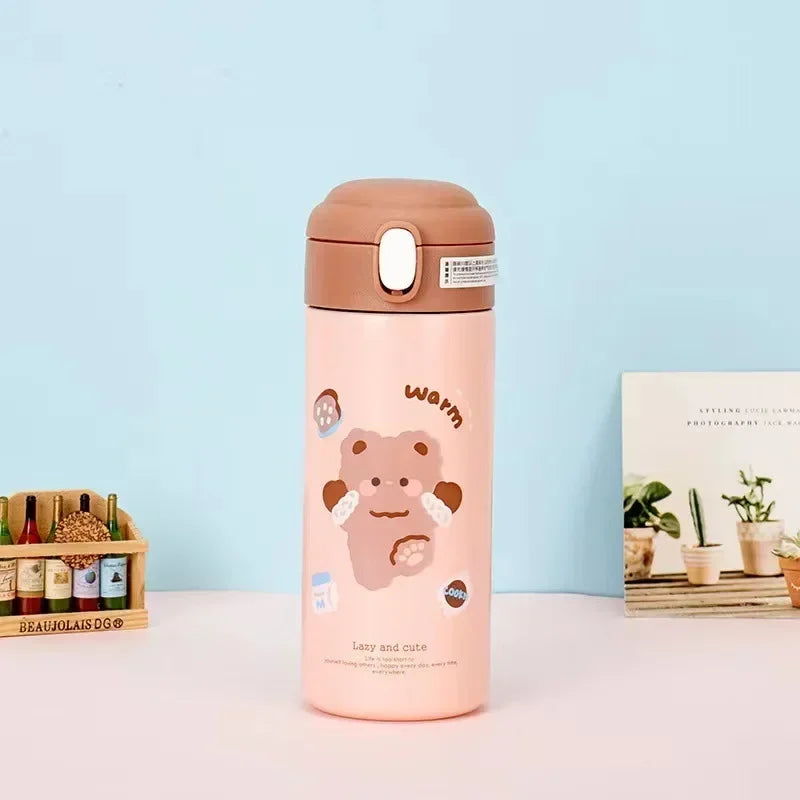 Pink thermos kawaii bottle with bear design on a light blue background