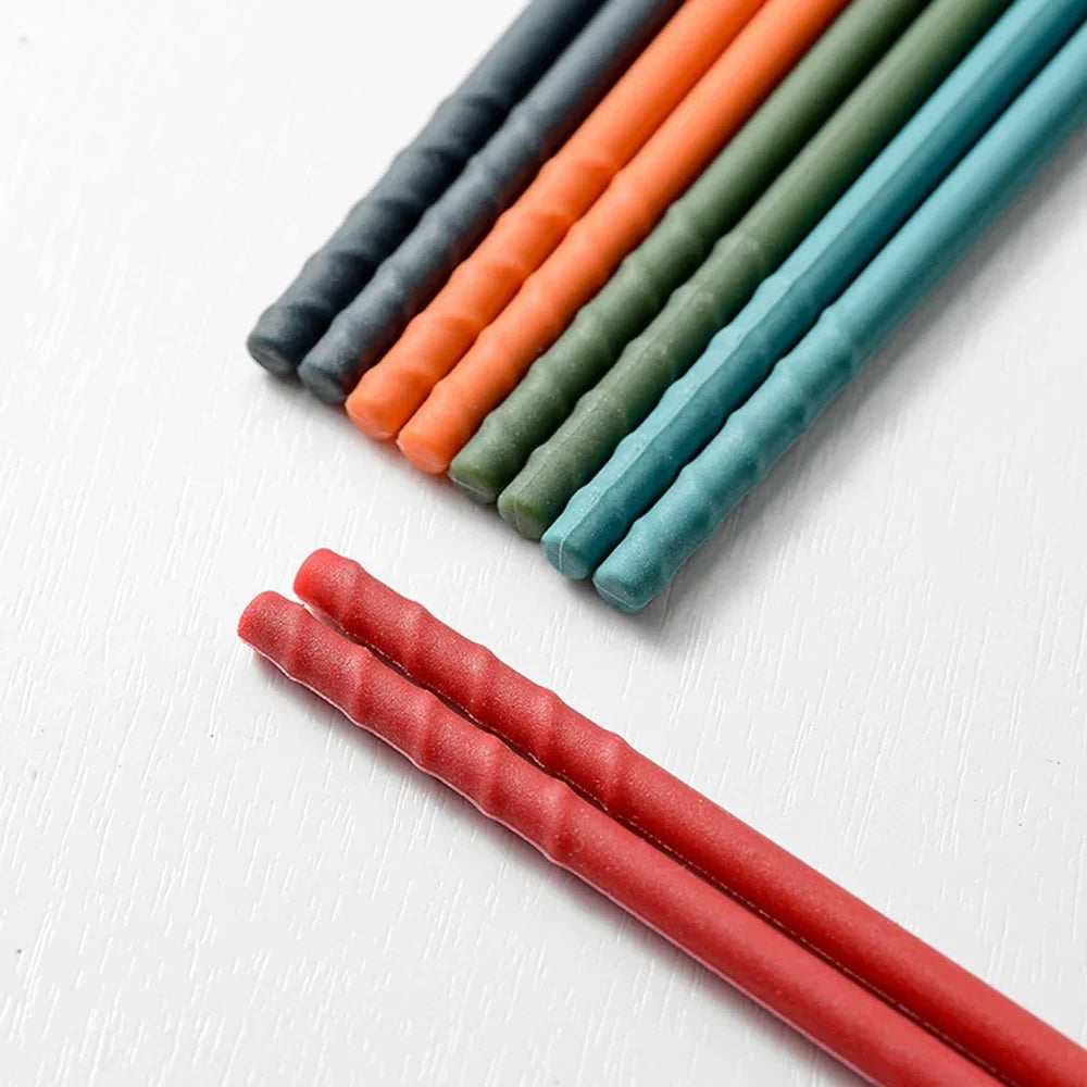 Set of colorful kawaii chopsticks on a white background