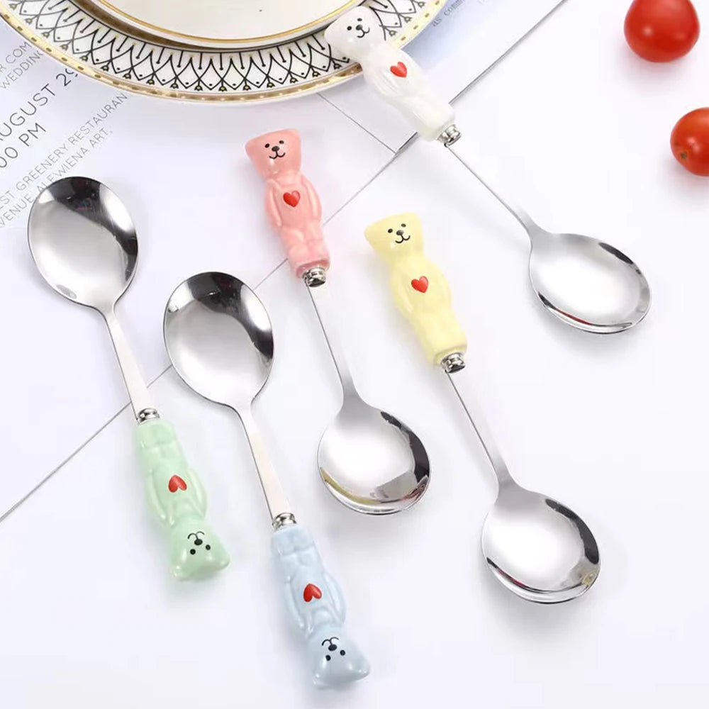 A set of kawaii utensils shaped like bears of various colors