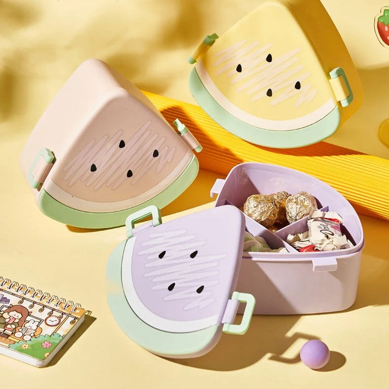 Set of colorful fruit-shaped kawaii bento boxes on a yellow background