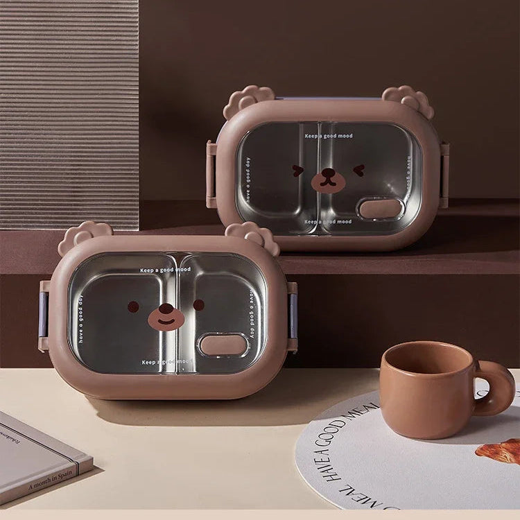 Two kawaii pink bear-shaped containers with a transparent lid on a brown surface.