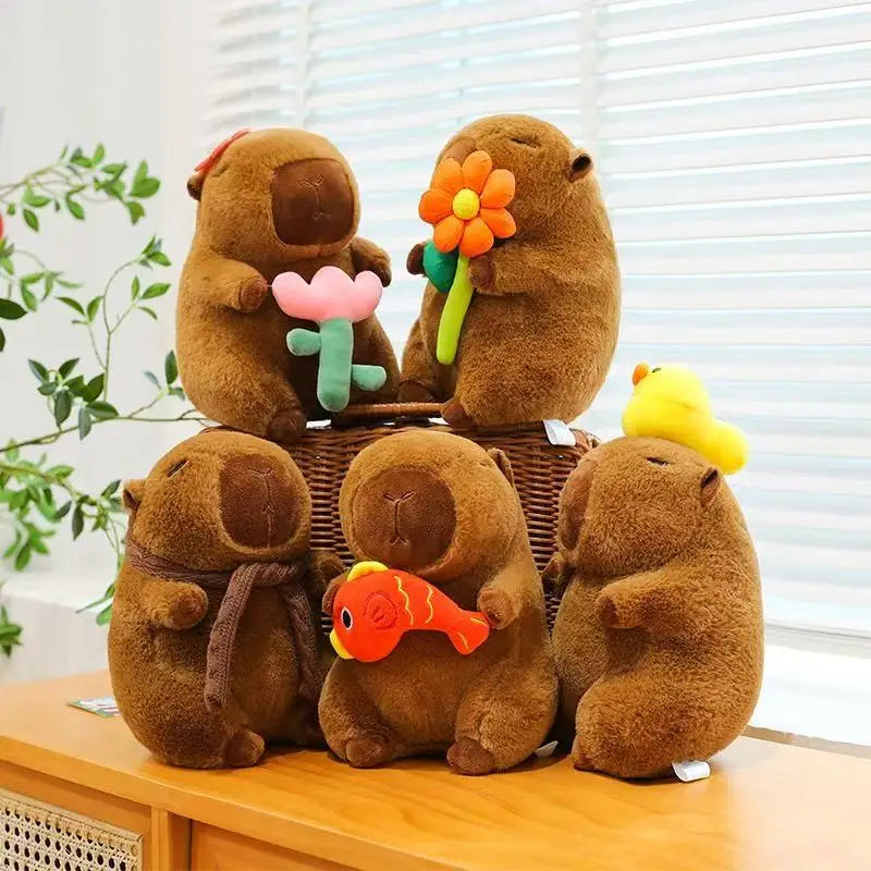 Set of brown kawaii plush toys resembling animals on a wooden surface with a blurred indoor background.