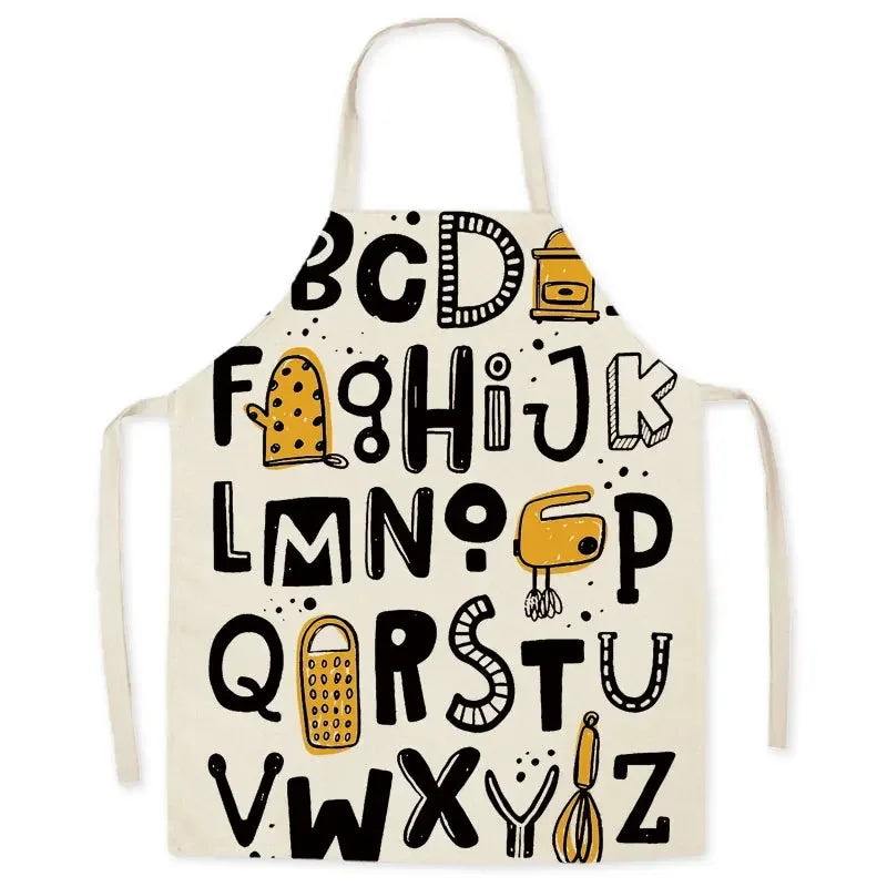 Beige kawaii apron with black and yellow alphabet design on a white background