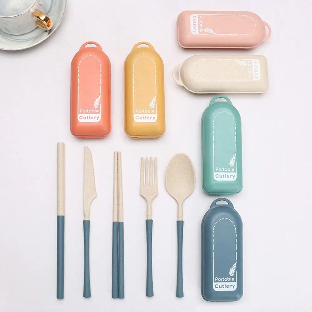 Set of portable kawaii utensils with colorful cases on a white background