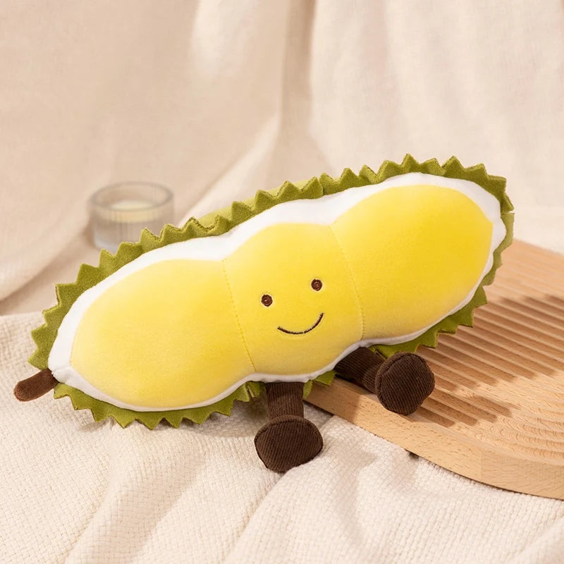 Plush toy resembling a durian fruit with a smiling face on a beige background